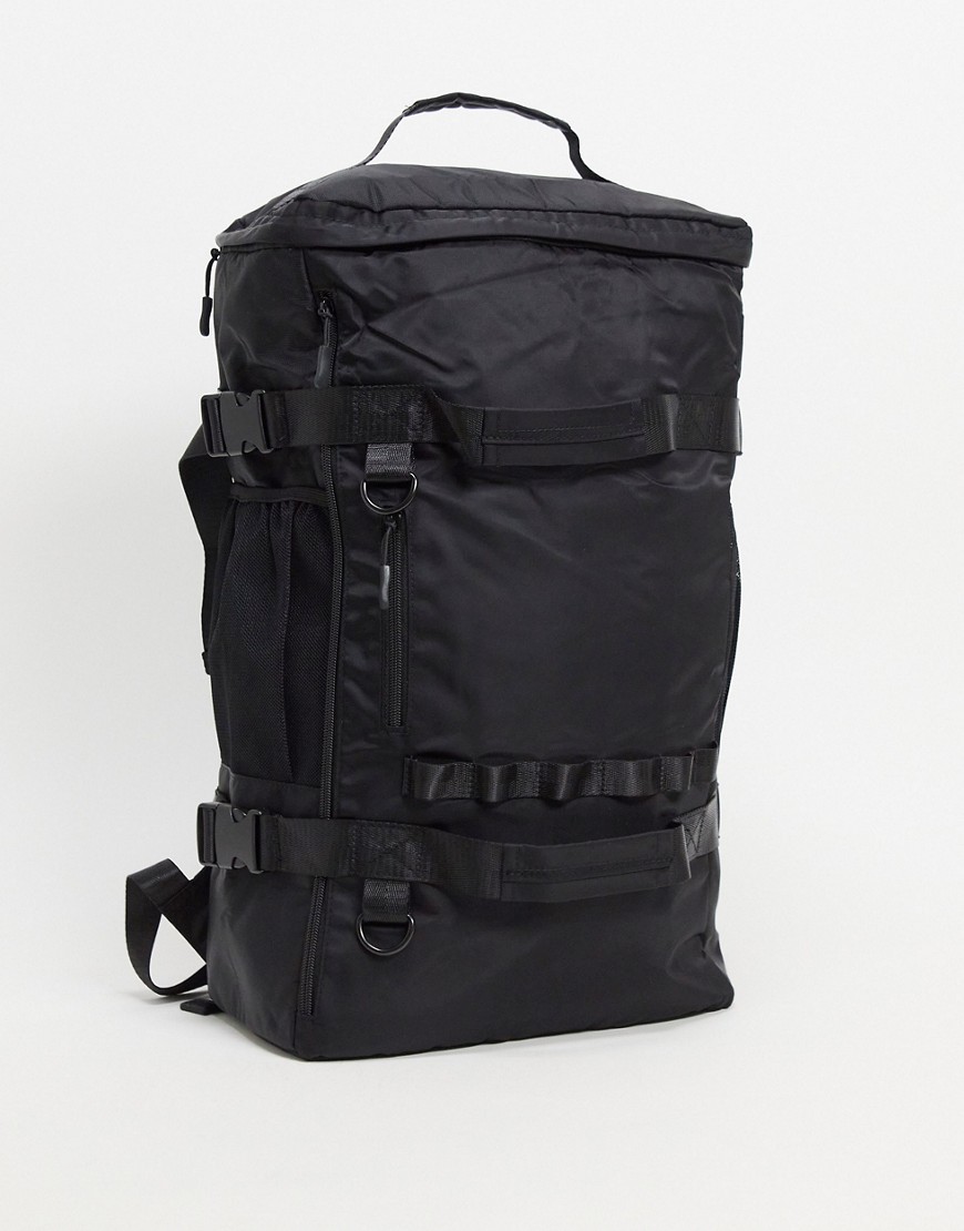 ASOS DESIGN - Hybrid duffle-rygsæk i sort med mange lommer - 25 liter