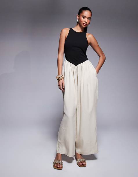 ASOS DESIGN – Hybrid-Jumpsuit mit weitem Bein aus Jersey- und Neoprenmaterial - view 1