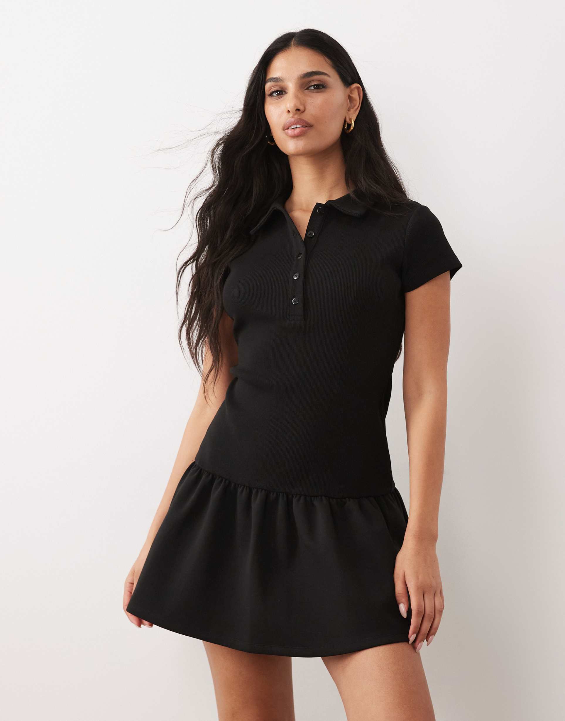 asos design hybrid rib interlock peplum hem mini polo dress in black