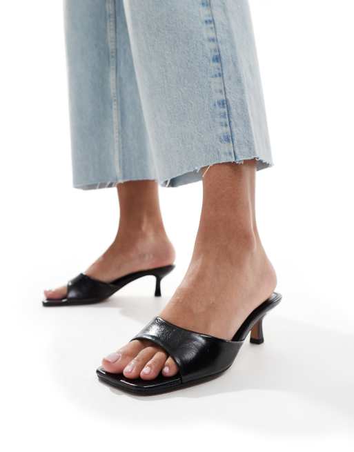 ASOS DESIGN Hyper Mules in Schwarz mit Pfennigabsatz