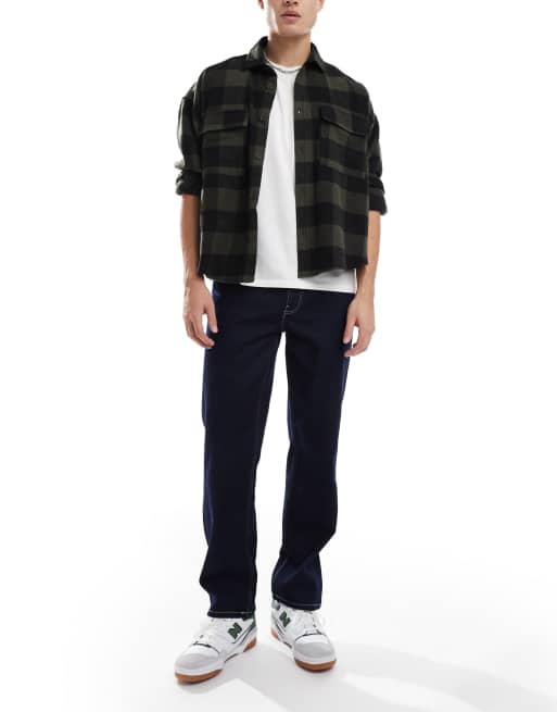 ASOS DESIGN - Indigoblå jeans med lige ben og kontrastsyninger