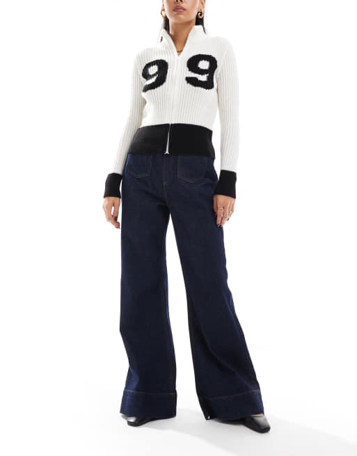 ASOS DESIGN - Indigoblå jeans med svaj og påsyet lomme