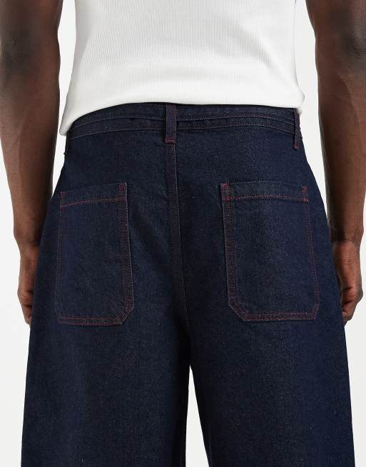ASOS DESIGN – Indigoblå, lediga jeansshorts i lång modell med kontrastsömmar , 4 av 5