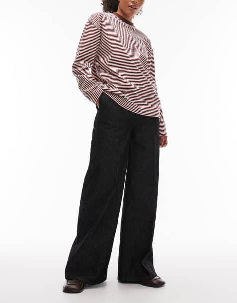 ASOS DESIGN – Indigoblaue Jeans mit extrem weitem Bein, Bügelfalte und brauner Tönung - view 1