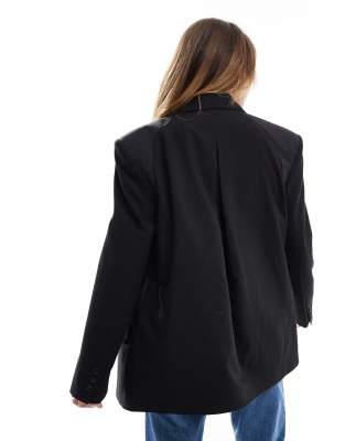 ASOS DESIGN inside out tailored oversized blazer in black