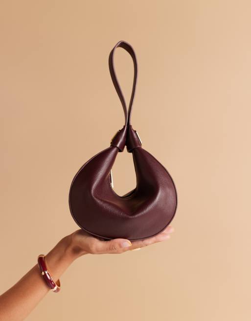 ASOS DESIGN interchangeable clutch and shoulder bag in burgundy