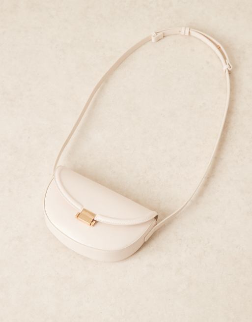 ASOS DESIGN interchangeable curved shoulder and crossbody bag with lock detail in white, 2 of 4