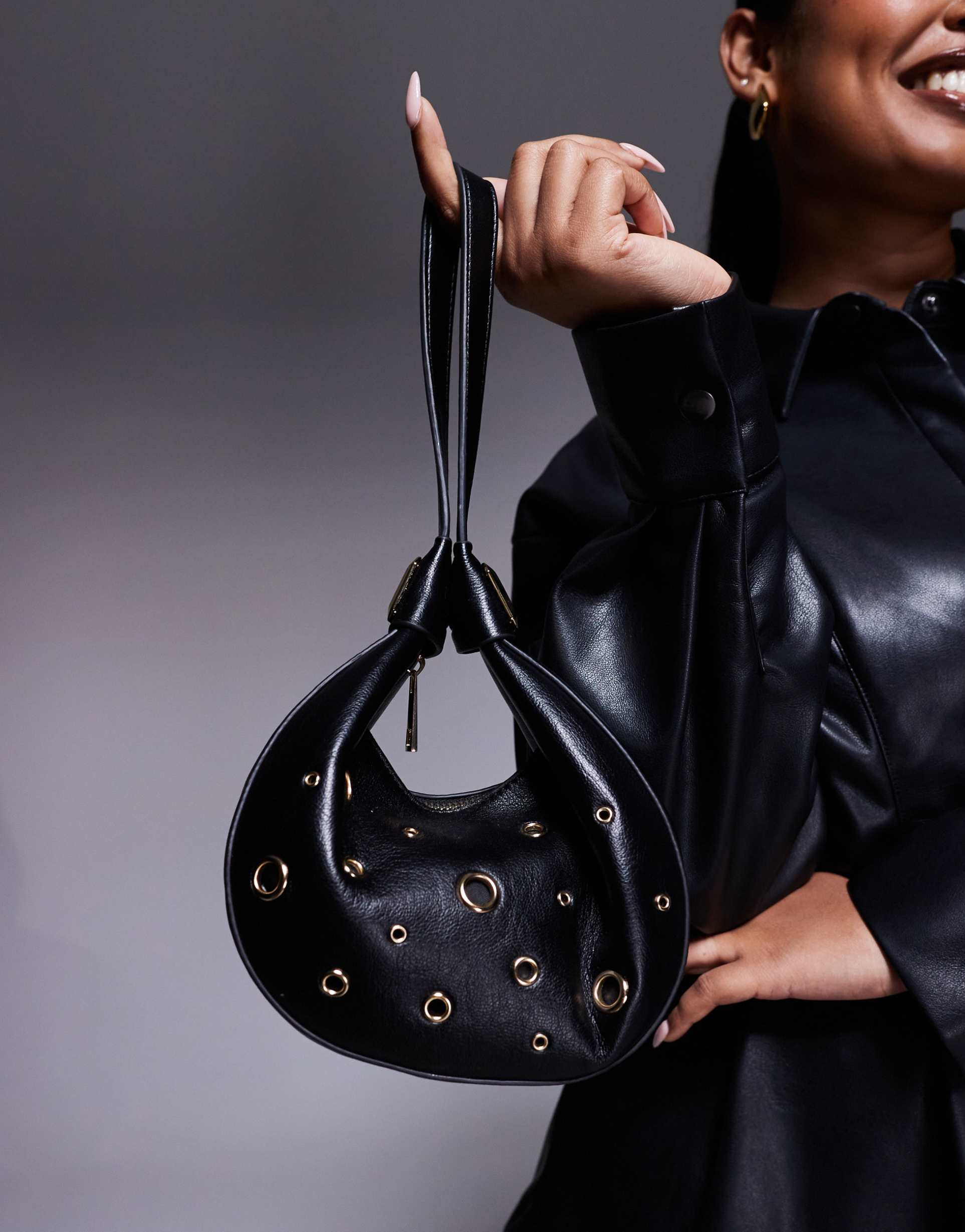 asos design interchangeable shoulder and clutch bag with grommet studs in black