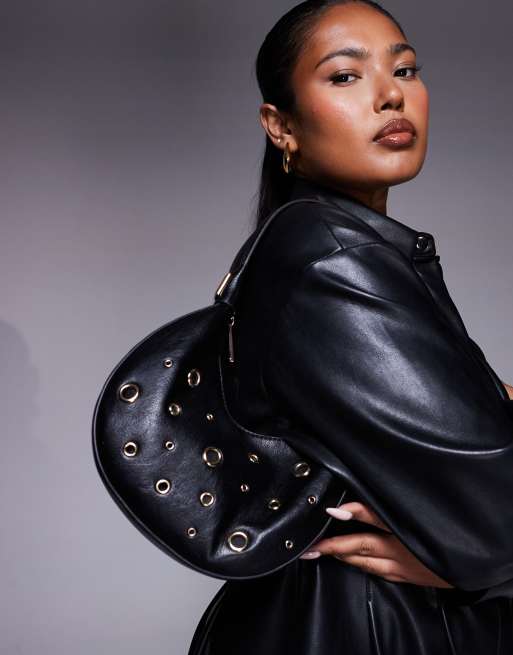 ASOS DESIGN interchangeable shoulder and clutch bag with grommet studs in black