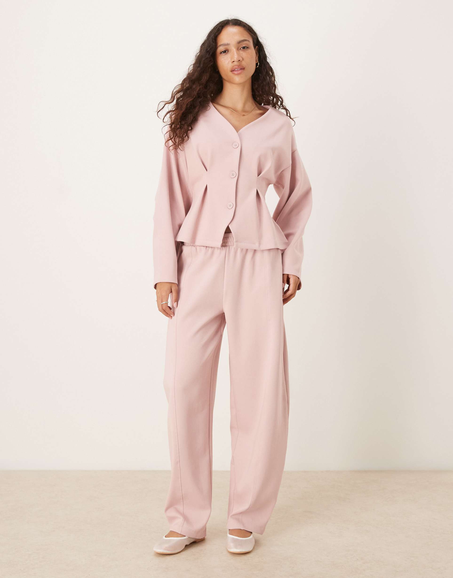 asos design interlock barrel leg sweatpants with seam detail in pink