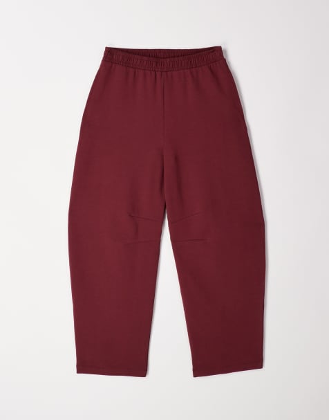 ASOS DESIGN interlock barrel leg trackies in burgundy - view 1