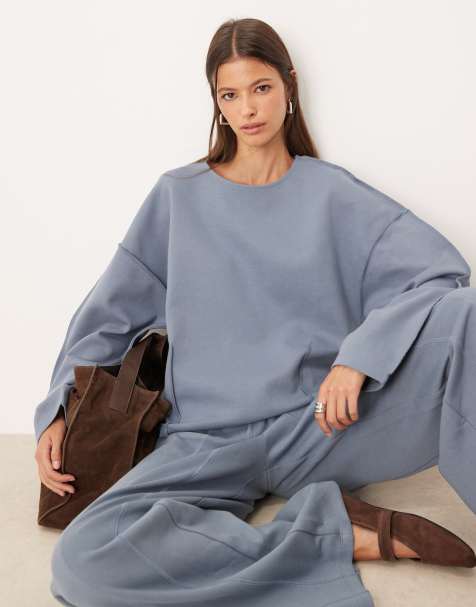 ASOS DESIGN interlock boat neck sweat with seam detail in blue