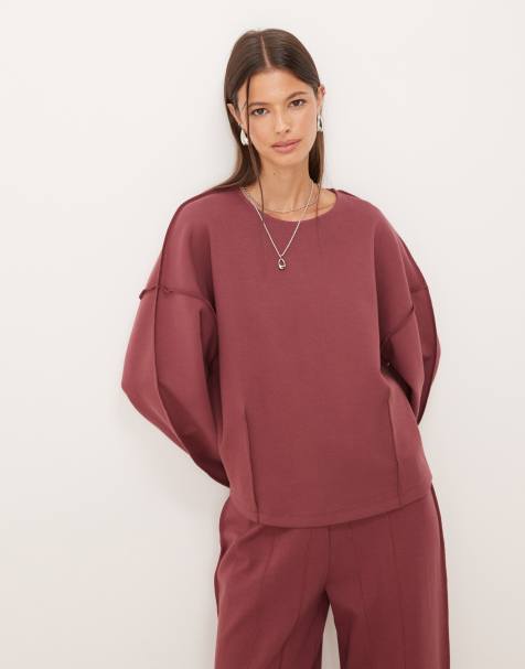 ASOS DESIGN interlock boat neck sweat with seam detail in dark rose