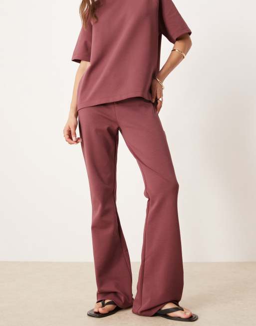 ASOS DESIGN interlock flared sweatpants in dark rose - part of a set