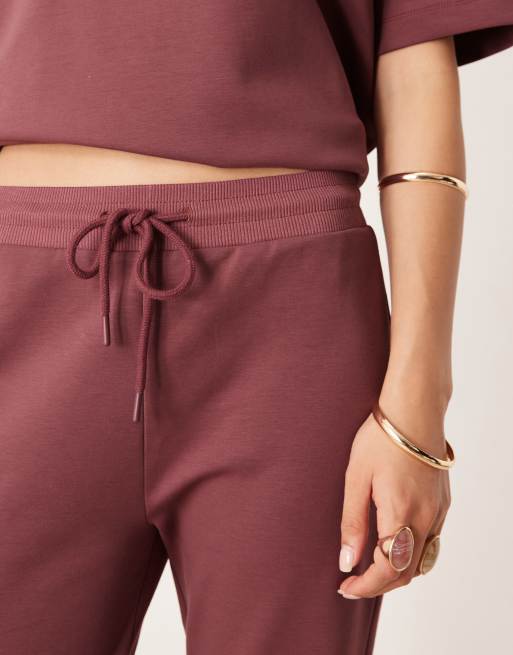 ASOS DESIGN interlock flared sweatpants in dark rose - part of a set