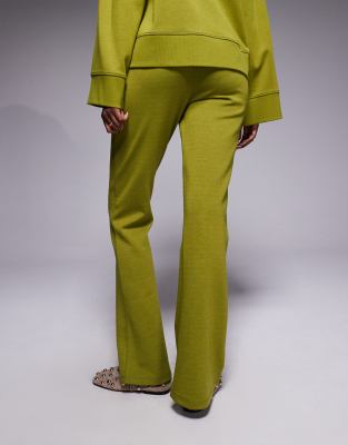 Asos Design Interlock Flared Sweatpants In Green