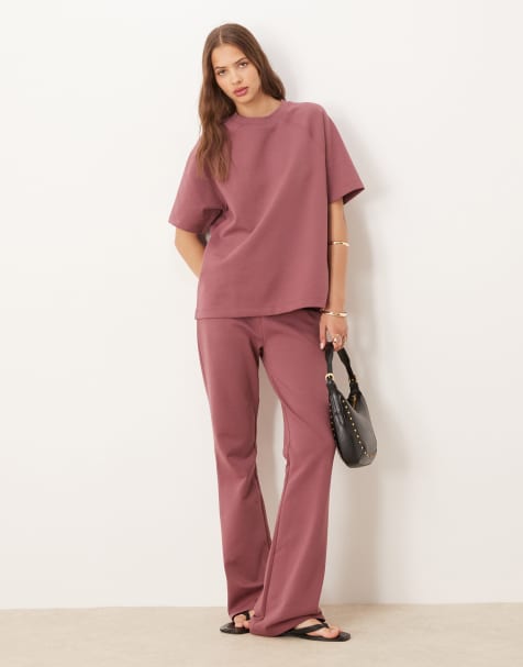 ASOS DESIGN interlock flared sweatpants in wild ginger - part of a set - view 1
