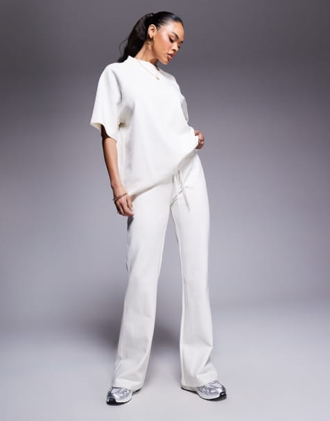 ASOS DESIGN interlock flared trackies in coconut milk (part of a set) - view 1