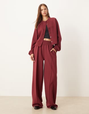ASOS DESIGN - Interlock-Hose in Burgunderrot mit weitem Bein