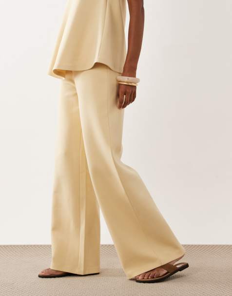 ASOS DESIGN – Interlock-Hose in Buttermilchgelb mit weitem Bein, Kombiteil - view 1