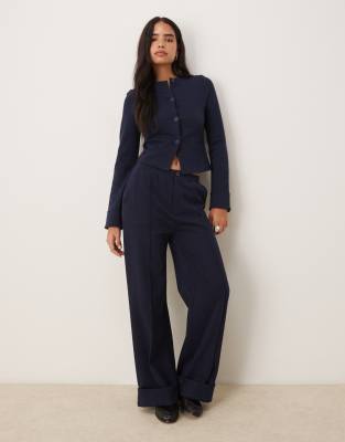 ASOS DESIGN - Interlock-Jogginghose in Marineblau mit Krempelsaum