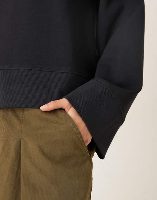 ASOS DESIGN interlock oversized crew neck top in black, 2 of 4