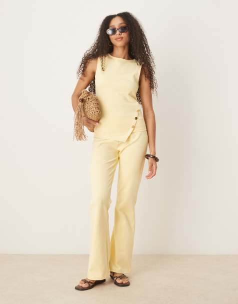 ASOS DESIGN interlock pants in yellow - part of a set - view 1