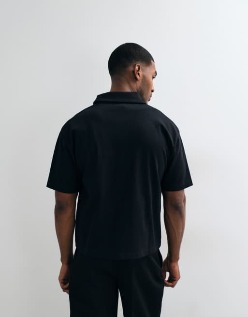 ASOS DESIGN Interlock relaxed boxy polo with zip up in black, 5 of 5