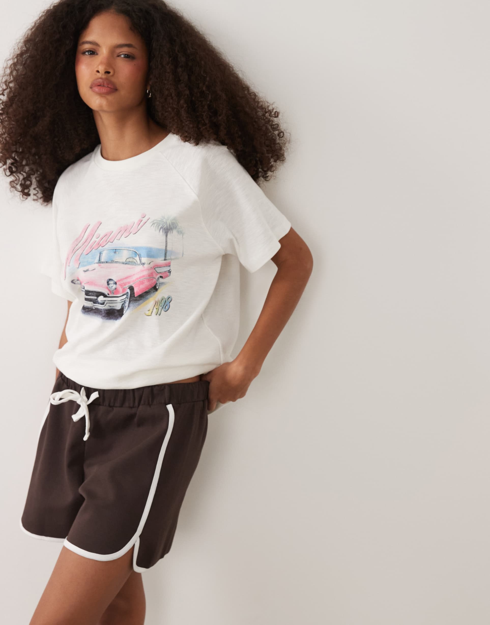 asos design interlock runner shorts with contrast tipping in chocolate