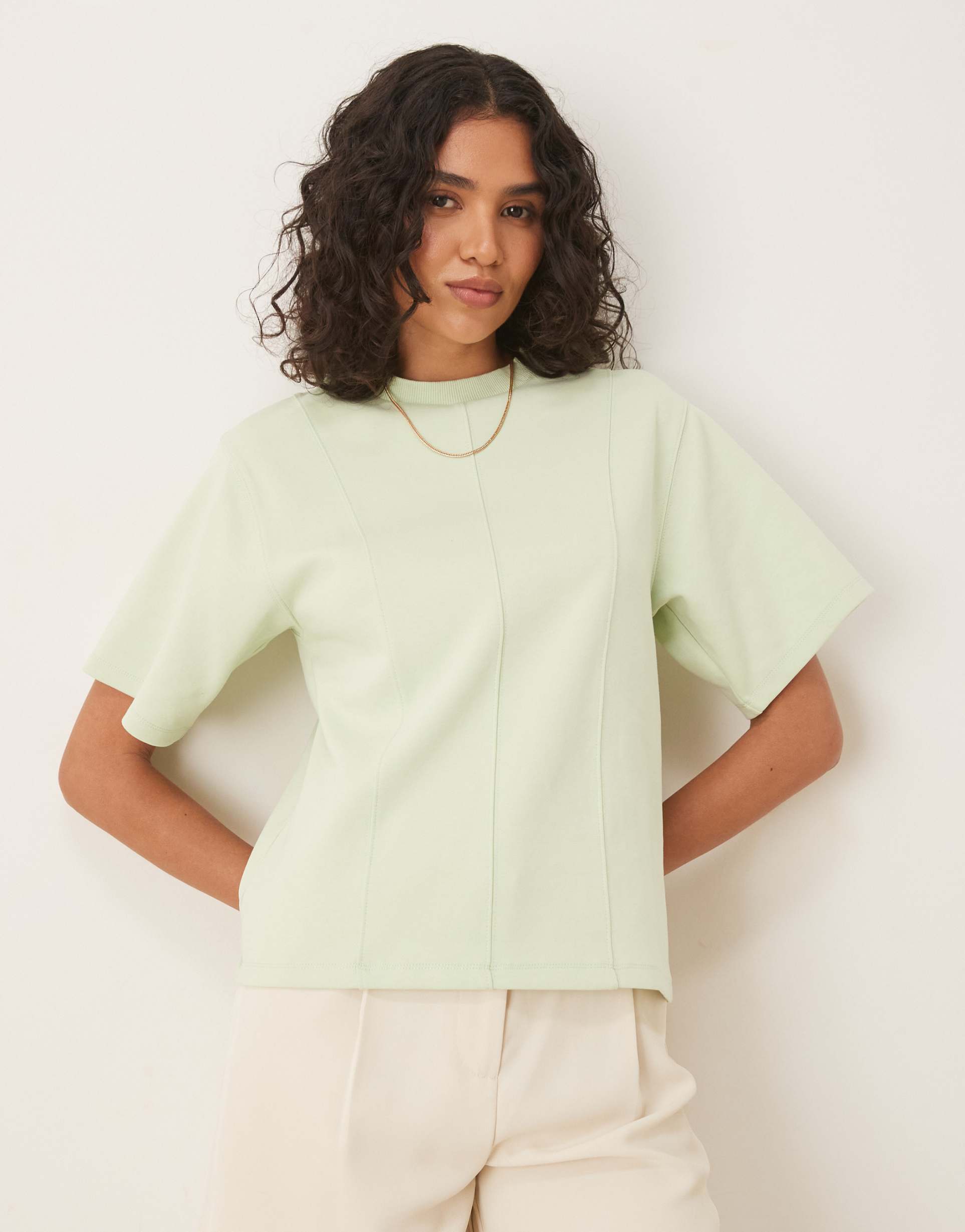 asos design interlock short sleeve top with seam and top stitch detail in pastel green