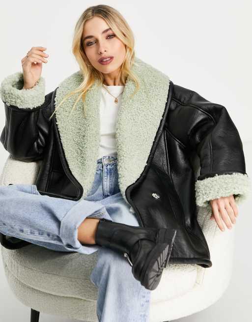 ASOS DESIGN – Jacke zum Überziehen in Schwarz mit salbeigrünem Teddyfellbesatz