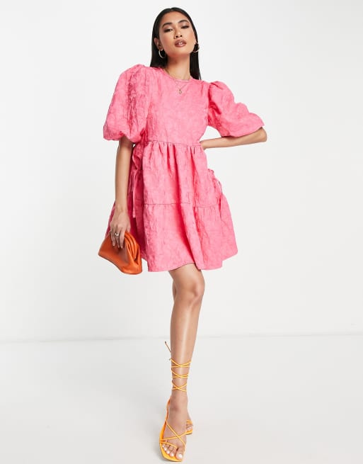 ASOS DESIGN jacquard tiered mini dress with bellow pockets in pop pink ...