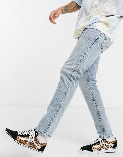 ASOS DESIGN – Jasnoniebieskie dopasowane jeansy z przetarciami
