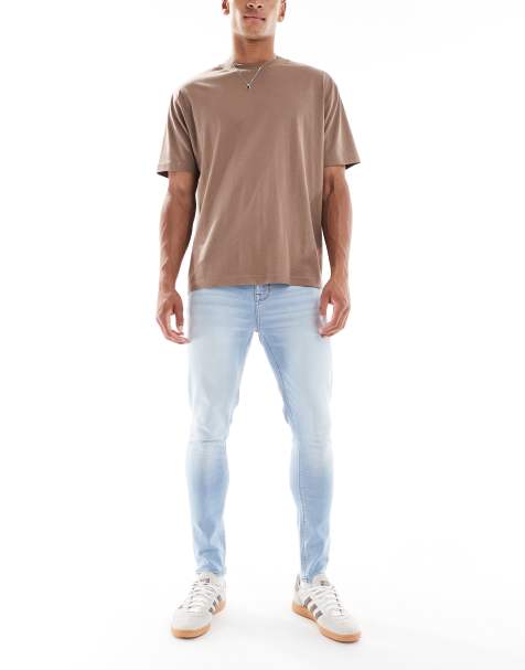ASOS DESIGN power stretch jeans in light wash blue
