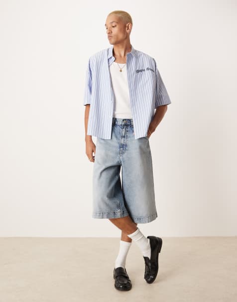 ASOS DESIGN – Jasnoniebieskie jeansowe jortsy o wydłużonym kroju z przebarwieniem - view 1