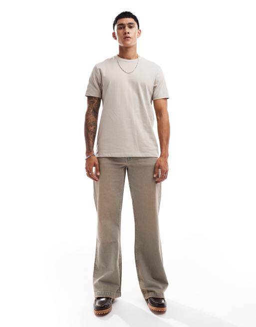 ASOS DESIGN – Jasnoniebieskie jeansy z rozszerzanymi nogawkami i przebarwieniami 
