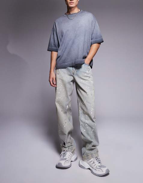ASOS DESIGN – Jasnoniebieskie luźne jeansy z efektem plam farby - view 1