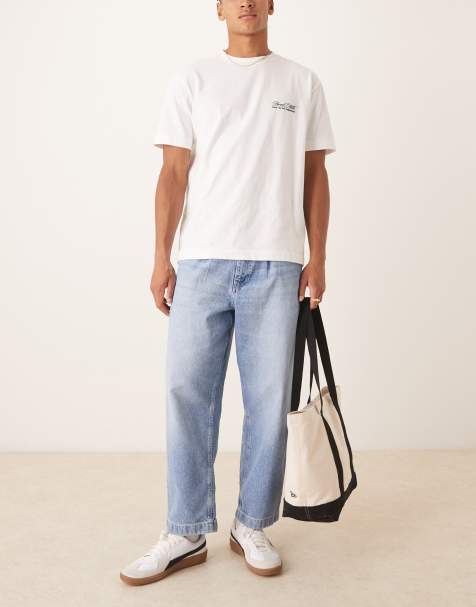 ASOS DESIGN relaxed tapered jeans in light wash blue