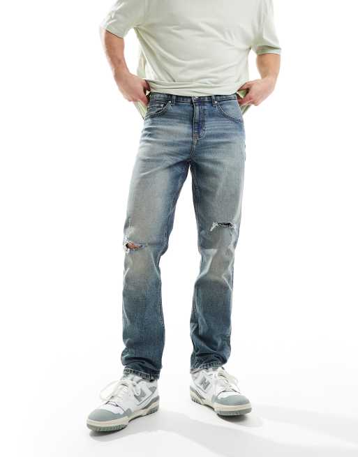 ASOS DESIGN – Jasnoniebieskie sprane dopasowane jeansy