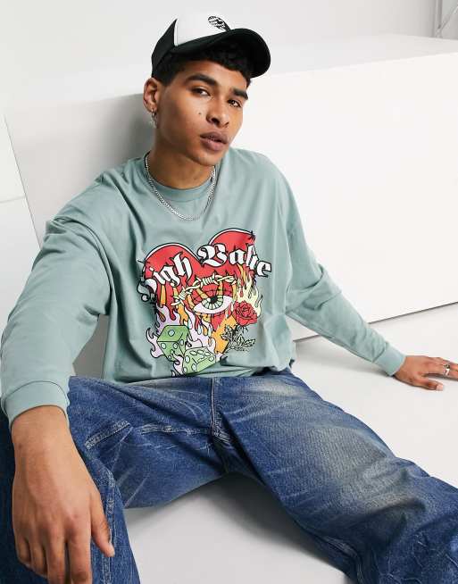 ASOS DESIGN – Jasnozielony T-shirt oversize z długimi rękawami i kreskówkowym nadrukiem z przodu