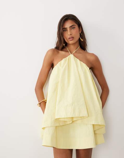 ASOS DESIGN – Jasnożółta trapezowa sukienka mini z dekoltem typu halter - view 1