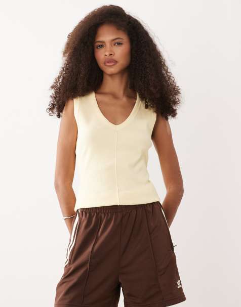 ASOS DESIGN ribbed v neck vest top with exposed seam detail in buttermilk