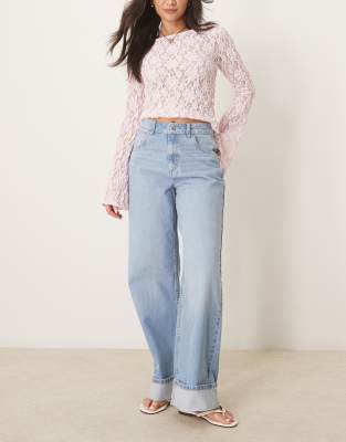 ASOS DESIGN - Jean ample à larges revers - Délavé bleu pâle