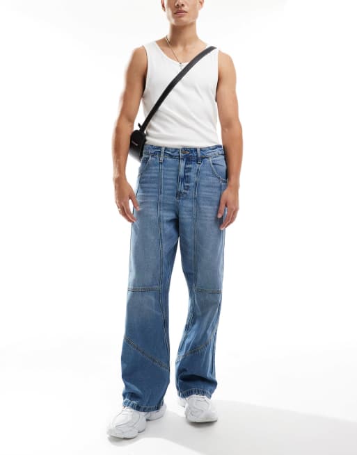 ASOS DESIGN - Jean baggy à ourlet large et empiècements - Bleu moyen