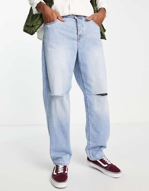 ASOS DESIGN - Jean baggy avec genoux déchirés - Bleu délavé moyen