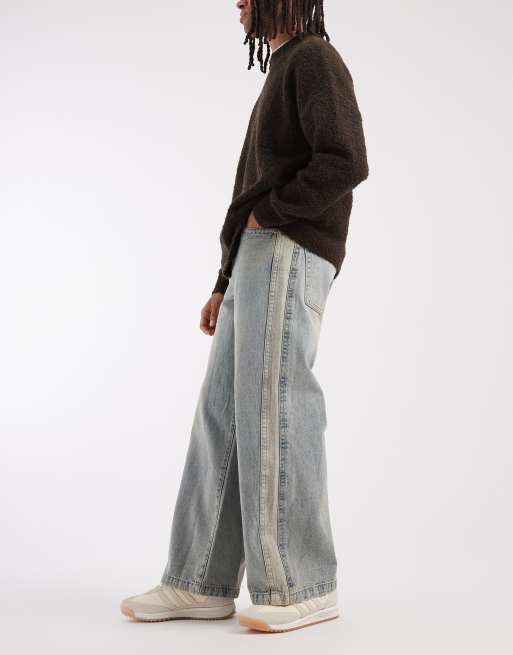 ASOS DESIGN jean baggy extrême avec empiècement latéral en bleu délavé clair teinté jaune, 2 de 5