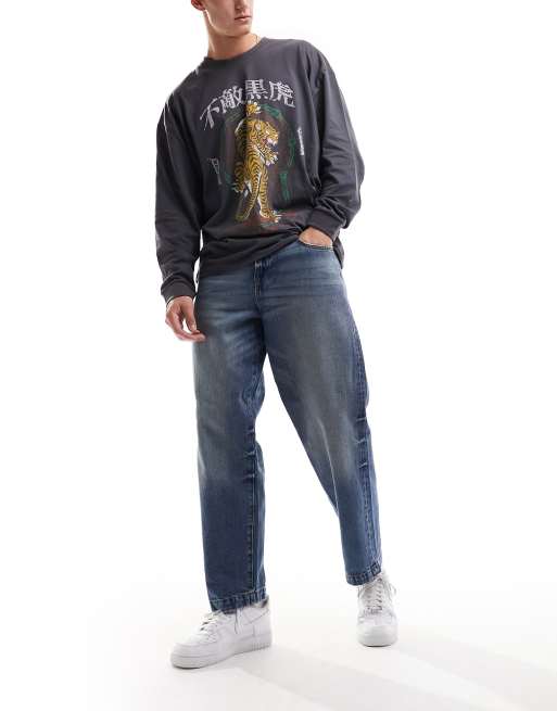 ASOS DESIGN - Jean baggy teint effet vintage - Bleu moyen
