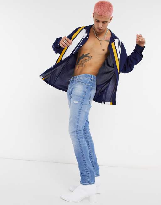 ASOS DESIGN - Jean cigarette 12,5 oz à abrasions - Bleu clair délavé vintage