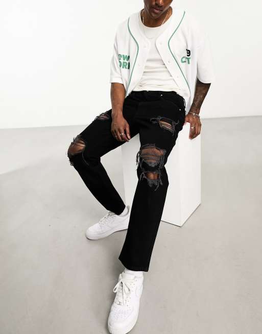 ASOS DESIGN - Jean classique rigide avec grosses déchirures aux genoux - Noir délavé