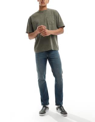 ASOS DESIGN - Jean coupe slim - Bleu délavé moyen - view 1